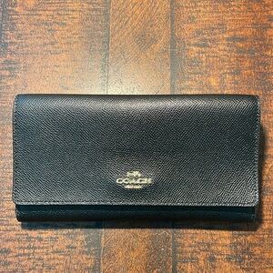 Coach Tri-fold large wallet.